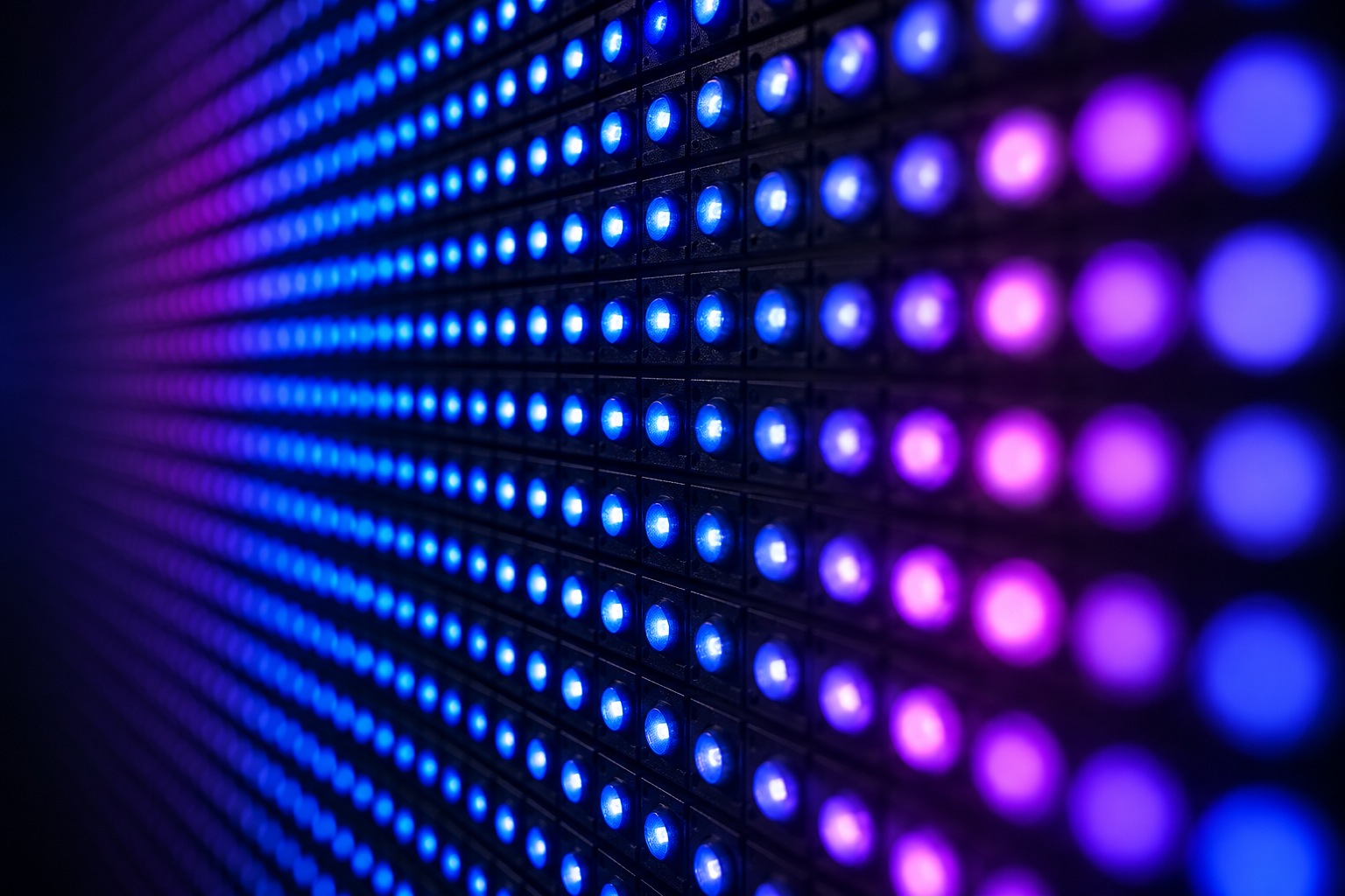 Illustrative macro view of illuminated blue and violet LED pixels